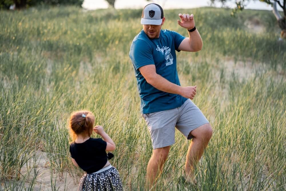 Man playing with his daughter